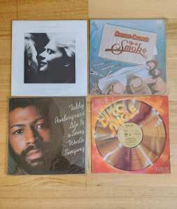 4 Vinyl Records - $10