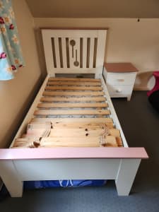 Single bed and side cupboard