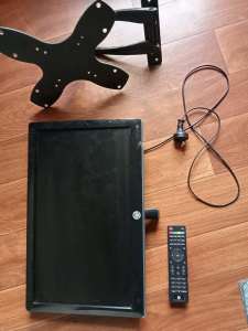 Tv with remote and wall mount