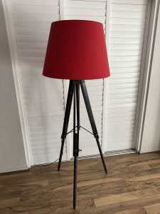 Lamp stand with red shade