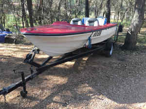 Fibreglass run-about with, outboard and trailer