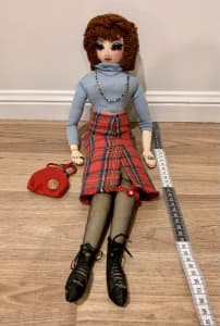 52cm artist doll wearing stockings, tartan skirt, long eyelashes