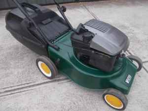 VICTA LAWN MOWER WITH WARRANTY. $ 160.