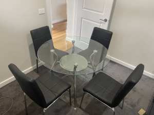 Glass black leather dinning suite