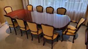 Grand mahogany scalable dining table, with 10 x Louis Chairs