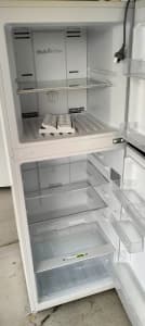 FRIDGE FREEZER AS NEW. WRONG SIZE.(TOO SMALL) comes w/h FREE microwave