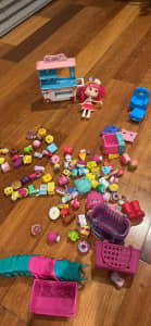 Shopkins over 90 pieces and a large shopkin girl with donut trolley