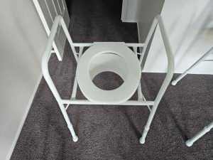 Aspire over toilet chair (riser) in as new condition