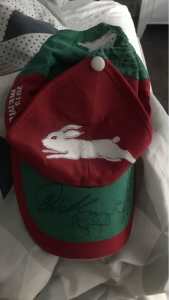Rabbitohs hat signed by three members