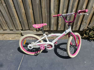 Girls bike. Pink and white, rides well.
