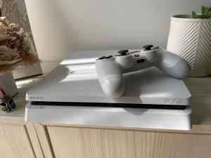 PS4 slim in great condition with 2x games
