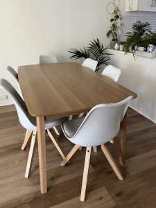 Dinning table with 6 white chairs