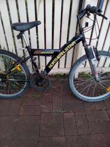 Mountain bike in good condition. Solid steel frame with 24 inch wheels