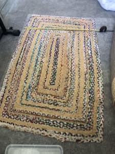 Multi-coloured jute and woven rug