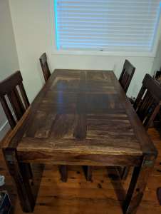 Solid hardwood dining table and six chairs