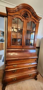 Antique writing desk with glass cabinet for sale.