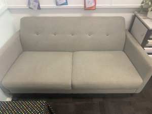 Grey two seater fabric lounge