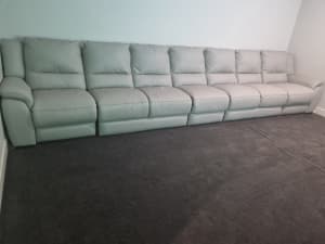 Plush, light grey leather electric recliner couch