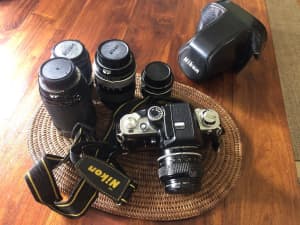 Nikon F2 SLR camera plus 4 additional lenses