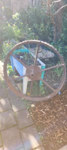 Antique large and cast blue iron wheel 800 cm across x95cm wide 