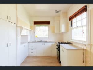 Kitchen cupboards, benchtop, pantry & exhaust fan.