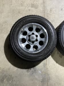 4 X Toyota FJ alloy wheels and Dunlop All Terrain tyres