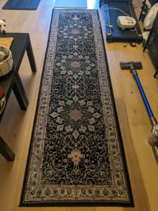 Black vintage style hallway rug from Ikea