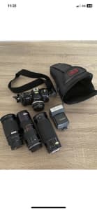 NIKON - F-301 SLR CAMERA with 52mm lens currently fitted