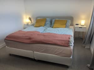 Queen bed frame with mattress and side tables