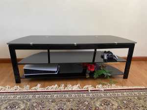 Black glass tv unit in excellent condition
