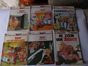12 Asterix magazines, fair condition, limited use, DUTCH edition