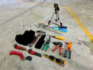 Various hand tools and level stand