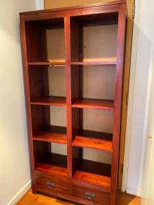 Solid timber red wood set of shelves.