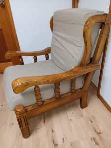 Antique carved wooden armchair