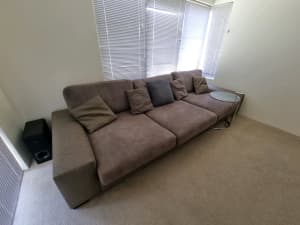 4 seater couch and adjustable drinks table 