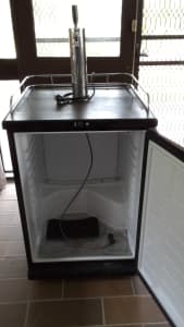 beer making equipment and fridge with beer tap