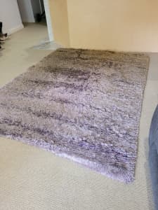 Rug hand knotted loop pile mauve/brown.
