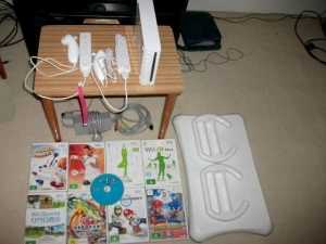 Nintendo Wii Console, 2 Controllers, 9 Games, Wii Fit Board
