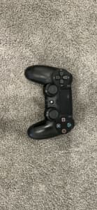 PlayStation 4 pro with controller