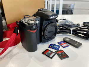 Nikon D90 DSLR camera, 18-200mm and 35mm lenses and accessories