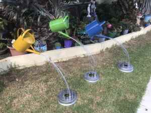 Water can garden ornaments