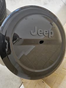Jeep wrangler 5 stock tyres with rims and original jeep cover new