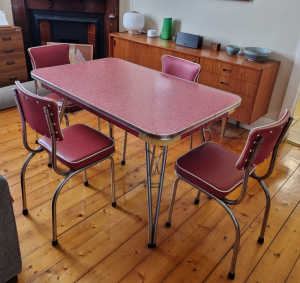 1960s red laminex table and 4 chairs in good condition.