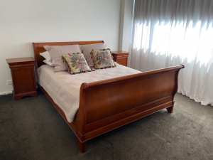 MUST BE SOLD!Solid timber QS sleigh bed with matching bedside cabinets