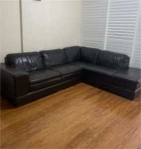 Black leather L shape lounge suite