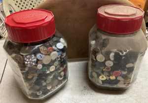 Vintage buttons in old coffee jars