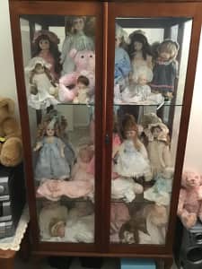 Handmade Doll collection includes lockable cabinet