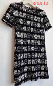 Size 12 stretchy cat printed dress. Cute, fun, casual, different 