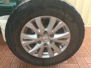 Mazda BT50 17 inch mag rims and tyres set of four plus one steel spare