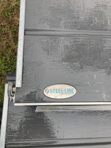 Steel line garage door in excellent condition 